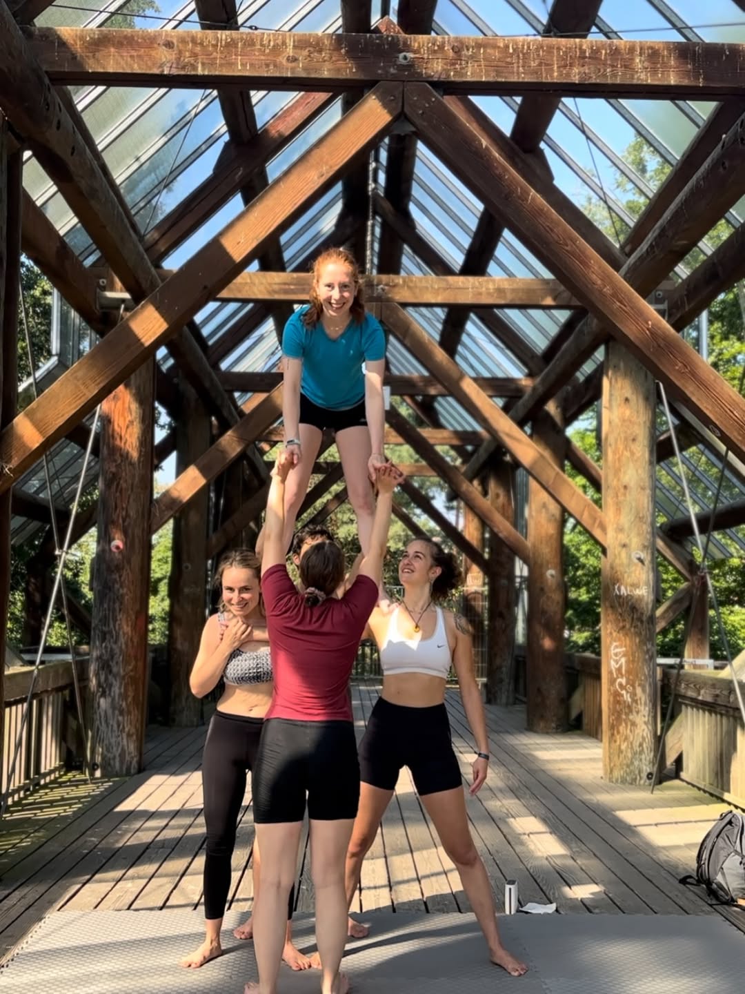 Standing AcroYoga at the covered bridge