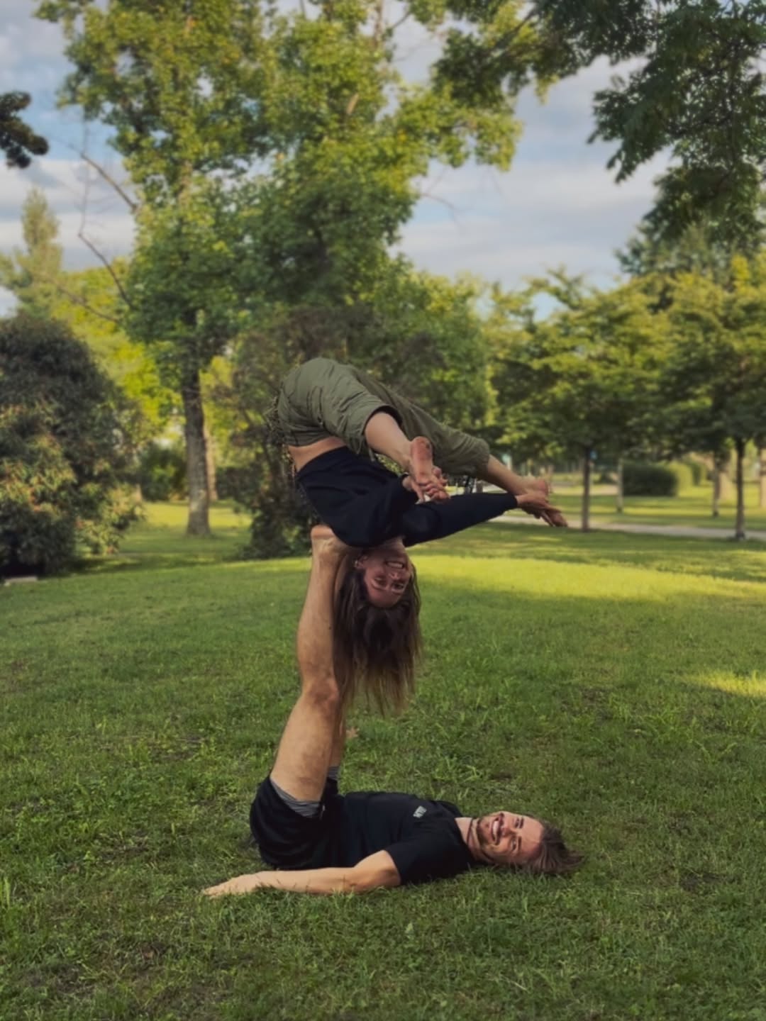AcroYoga bat-hang in the park